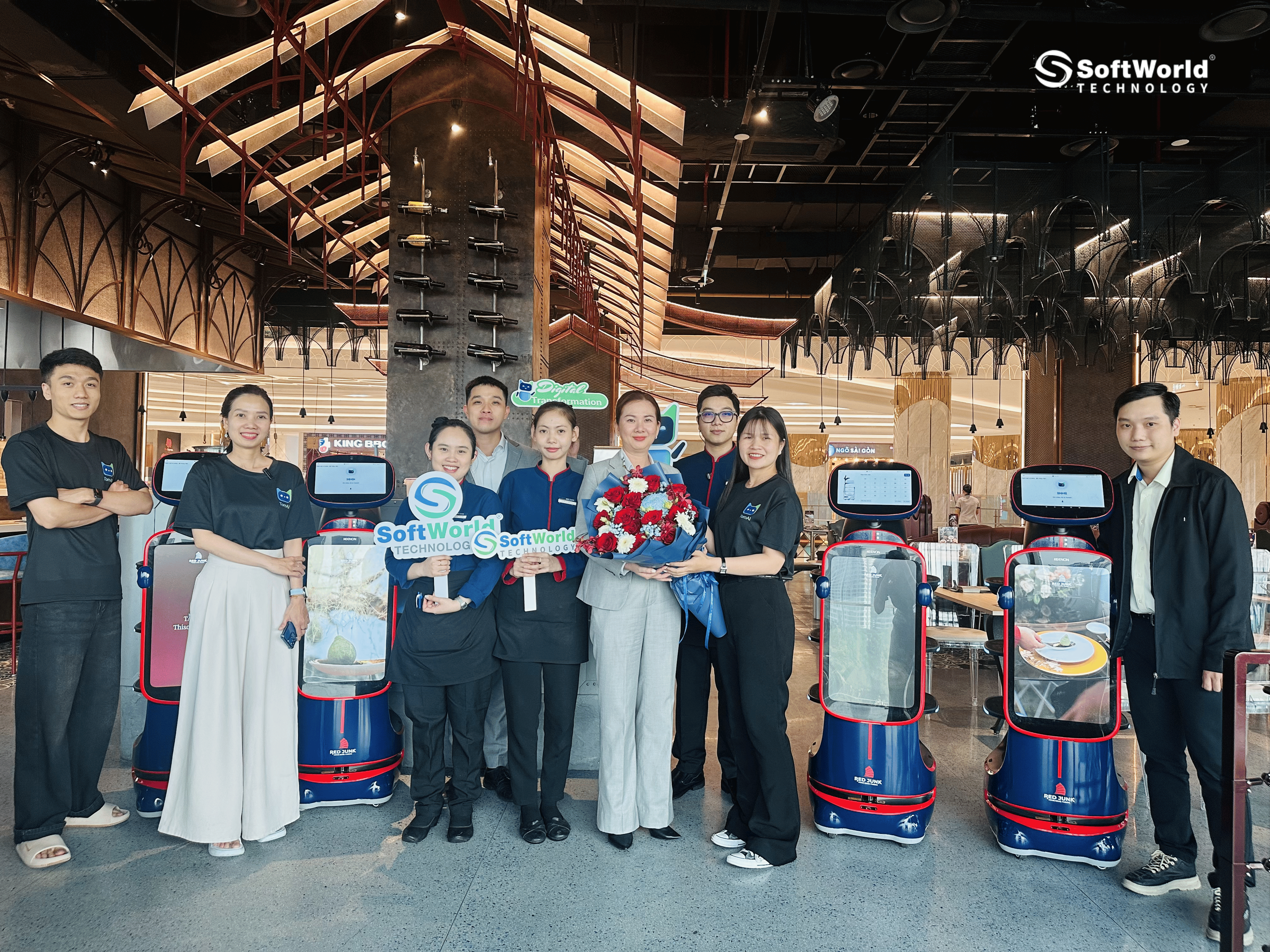 SoftWorld celebrating the successful deployment of TomAI Robotics at Red Junk 